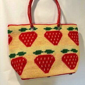 Strawberries. Ripe and a perfect bag to carry all of your summer treasures